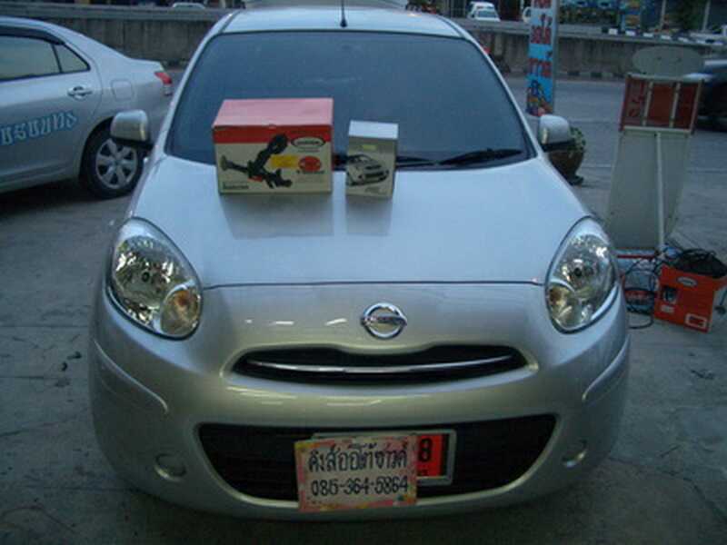 ลูกค้านำ รถยนต์ NISSAN MARCH มาติดตั้ง LOCKTECH กล่องส้ม 
